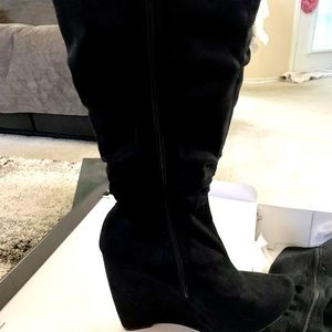 Wedge suede knee length zip up boots. Worn once.